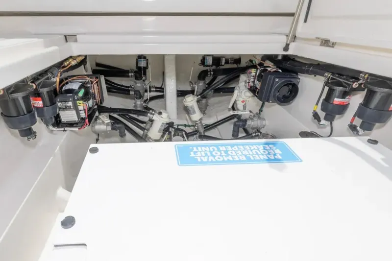 Slide: The Image of Engine compartment of 2024 Blackwater 43 Sportfish boat, showcasing mechanical components. - 47