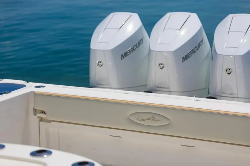 Slide: The Image of 2024 Blackwater 43 Sportfish boat with triple Mercury outboard engines. - 51