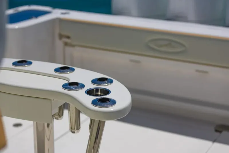 Slide: The Image of 2024 Blackwater 43 Sportfish boat detail with rod holders and sleek design. - 52