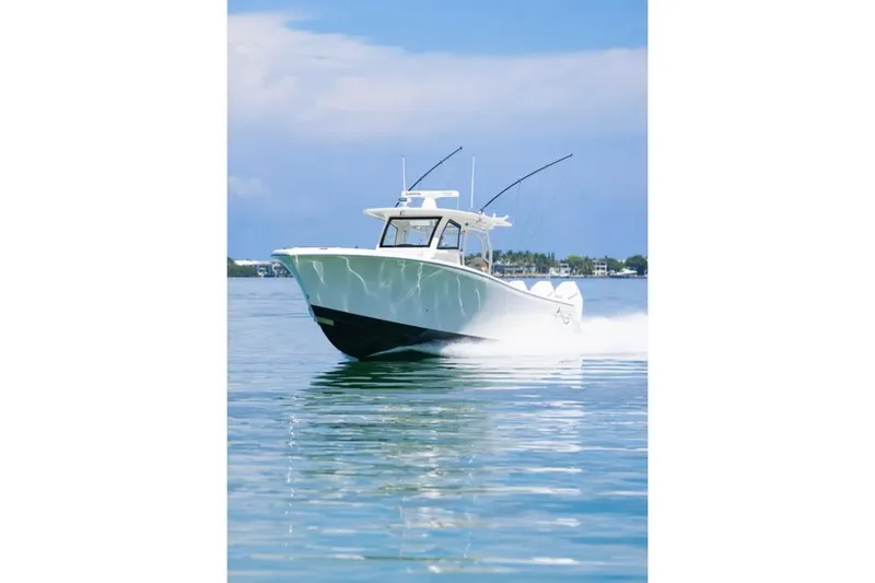 Slide: The Image of 2024 Blackwater 43 Sportfish boat cruising on calm water. - 59