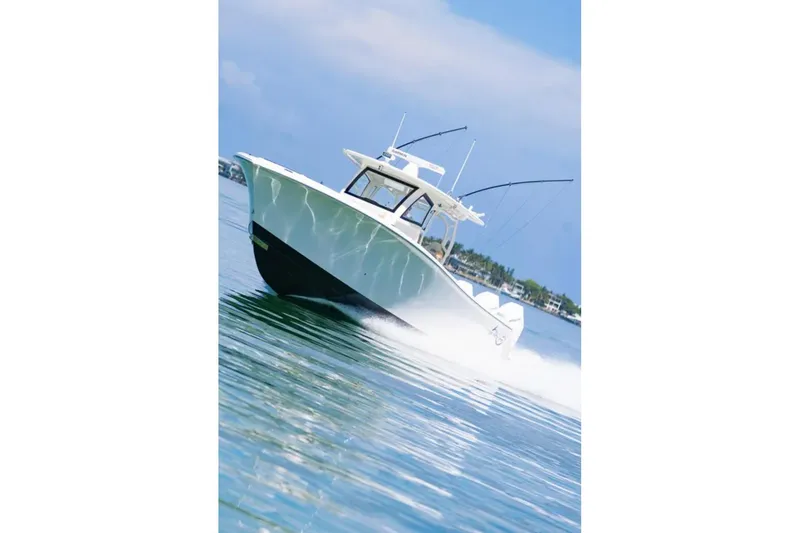 Slide: The Image of 2024 Blackwater 43 Sportfish boat cruising on calm waters. - 60
