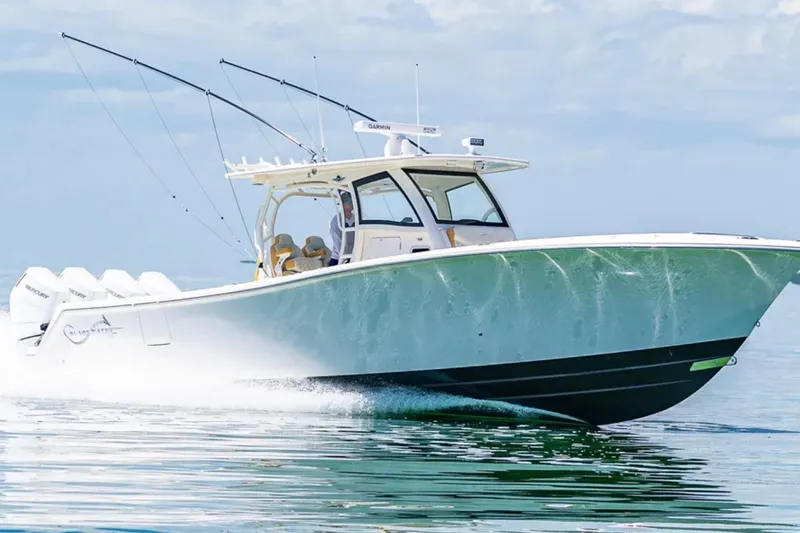 Slide: The Image of 2024 Blackwater 43 Sportfish boat cruising on calm water. - 66