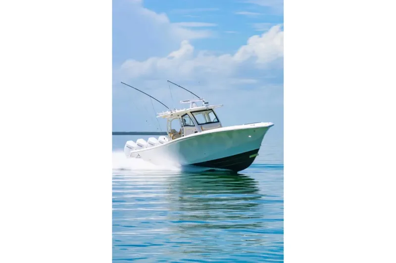 Slide: The Image of 2024 Blackwater 43 Sportfish boat cruising on calm blue waters. - 69