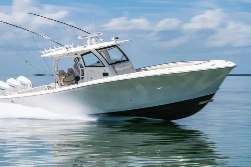 Slide: The Image of 2024 Blackwater 43 Sportfish boat cruising on calm water under a clear sky. - 71