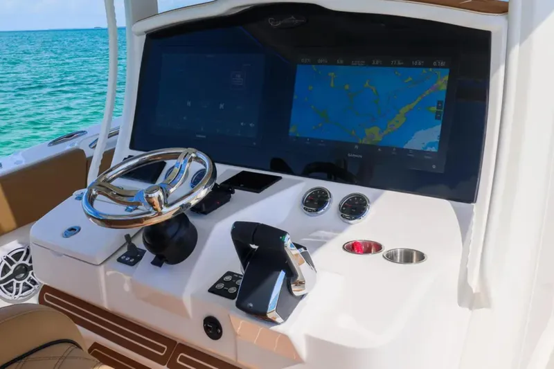 Slide: The Image of 2025 Blackwater 41 Performance Fish boat with Garmin equipment on open sea. - 19