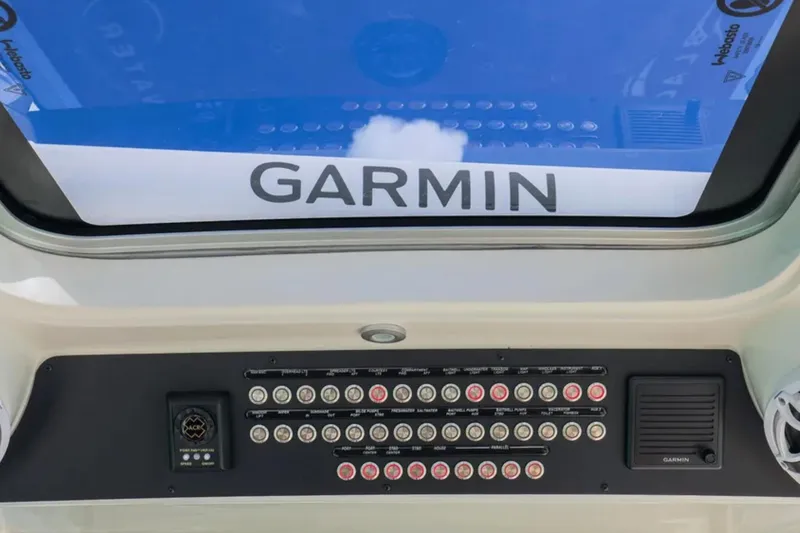 Slide: The Image of 2025 Blackwater 41 Performance Fish boat dashboard with navigation display and controls. - 23