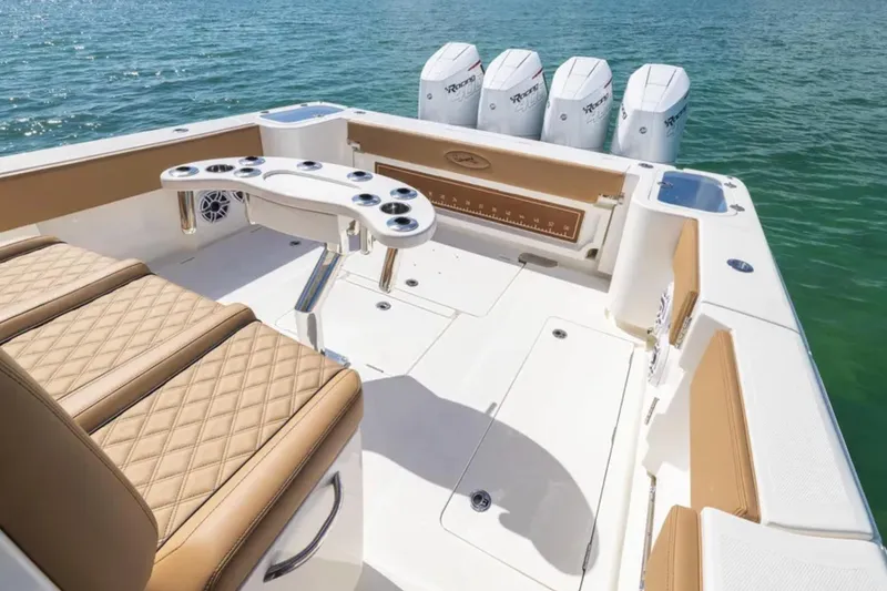 Slide: The Image of 2026 Blackwater 41 Performance Fish dashboard with RAM Quick-Grip phone holder and digital display. - 27