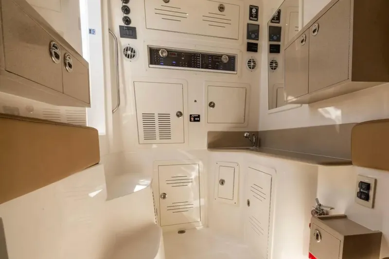 Slide: The Image of 2025 Blackwater 41 Performance Fish boat with luxurious seating and rod holders. - 31