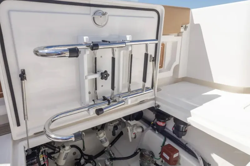 Slide: The Image of 2025 Blackwater 41 Performance Fish boat with tan seating and storage compartments. - 38