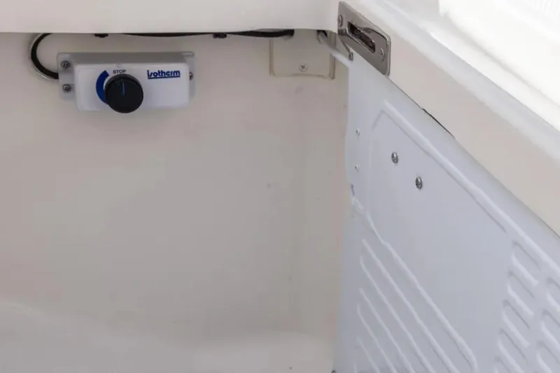 Slide: The Image of 2025 Blackwater 41 Performance Fish boat interior with tan seating and fishing amenities. - 39