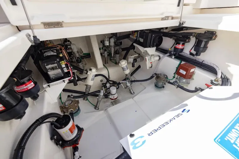 Slide: The Image of Luxurious cabin interior of 2026 Blackwater 41 Performance Fish boat with tan seating. - 51