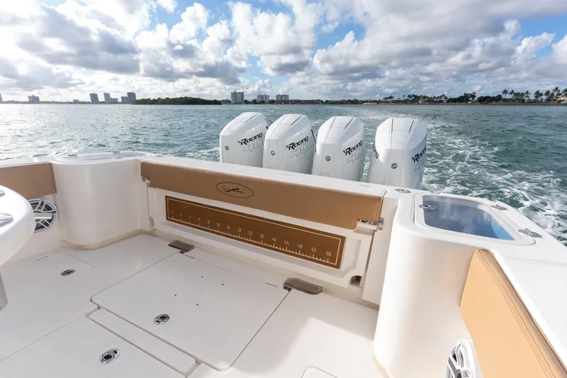 Slide: The Image of 2026 Blackwater 41 Performance Fish boat with luxurious seating and powerful outboard engines. - 62