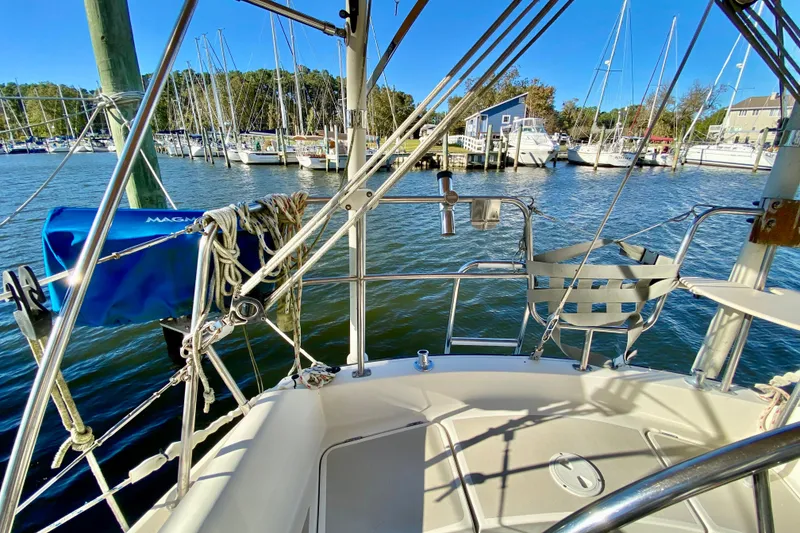 Slide: The Image of Cockpit view of 1987 O'Day 34 sailboat docked in a marina. - 9