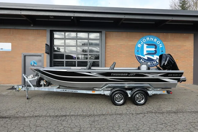 The Image of 2026 Thunder Jet 229 Rush OT boat on trailer at Bjornson Marine dealership. - 1
