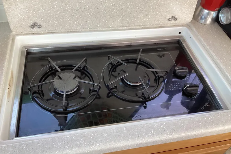 Slide: The Image of Gas stove with two burners on a 2008 Back Cove 33 boat. - 20