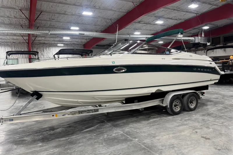 The Image of 2003 Regal 2900 LSR boat on trailer in indoor storage facility. - 1