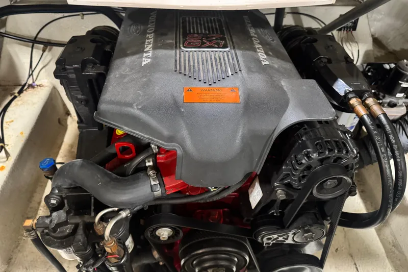 Slide: The Image of Engine of a 2003 Regal 2900 LSR boat, featuring Volvo Penta components. - 14