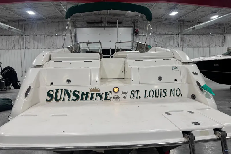 Slide: The Image of 2003 Regal 2900 LSR boat named "Sunshine" docked in St. Louis, Missouri warehouse. - 5