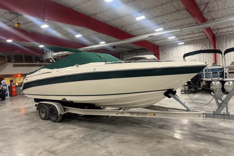 Slide: The Image of 2003 Regal 2900 LSR boat on trailer in indoor showroom. - 6