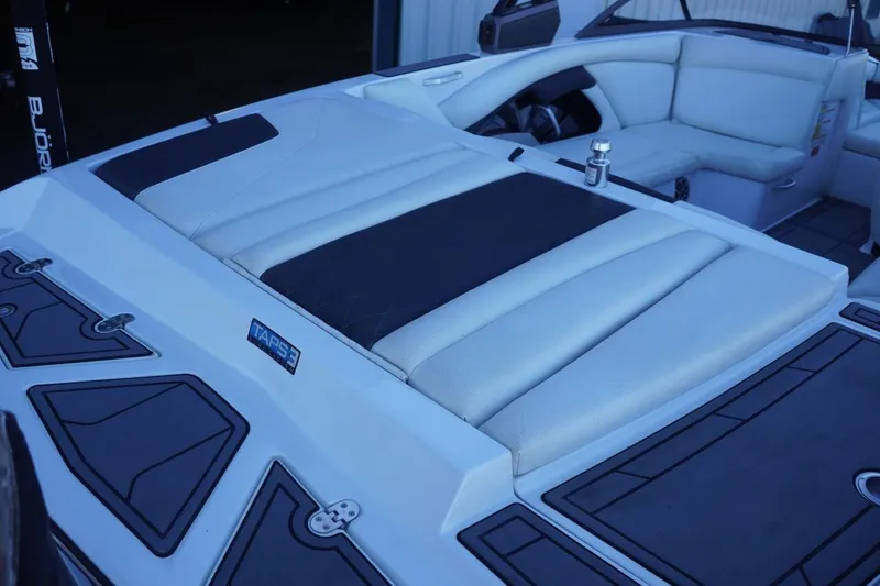 Slide: The Image of 2018 Tigé R22 boat interior with cushioned seating and TAPS 3 system. - 13