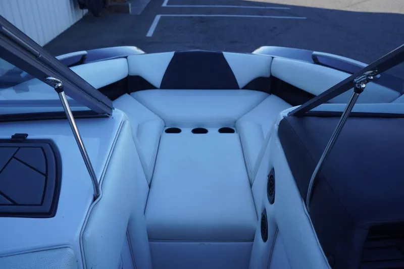 Slide: The Image of Interior of 2018 Tigé R22 boat, featuring sleek seating and modern design elements. - 18