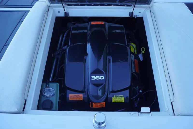 Slide: The Image of 2018 Tigé R22 boat engine compartment with 360 horsepower engine. - 24
