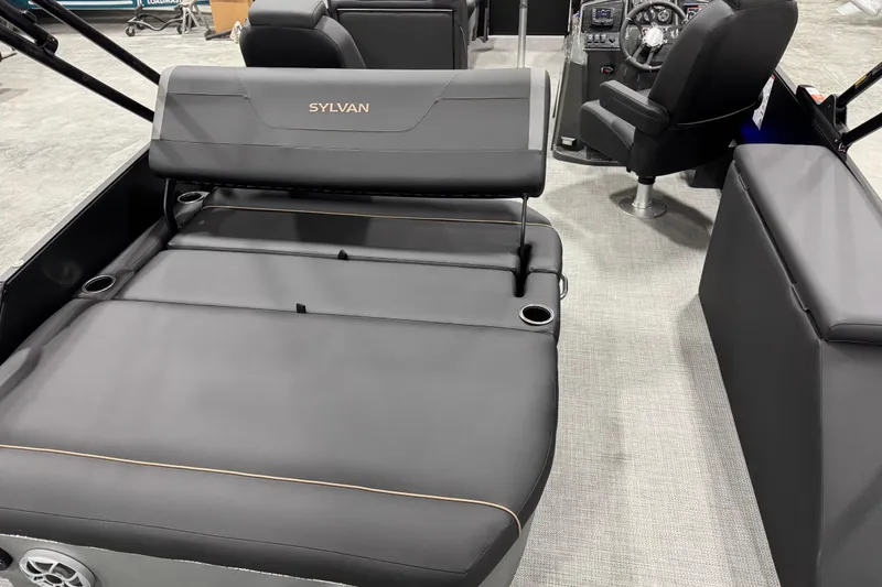 Slide: The Image of 2026 Sylvan Mirage X X5 boat interior with luxurious seating and modern dashboard. - 10