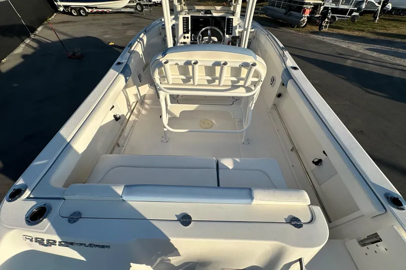 Slide: The Image of 2023 Robalo R222 Center Console boat interior with seating and console view. - 18