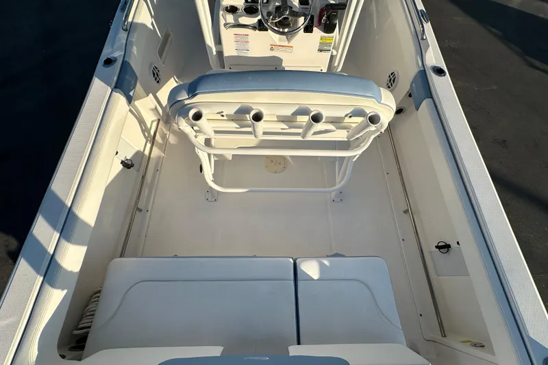Slide: The Image of 2023 Robalo R222 Center Console boat interior with seating and console view. - 20