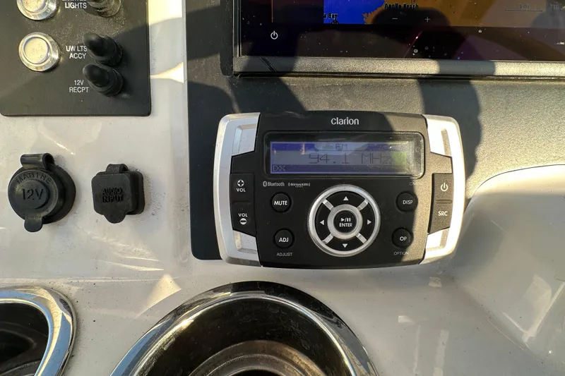Slide: The Image of Yamaha display on 2023 Robalo R222 Center Console showing trip data and settings. - 30