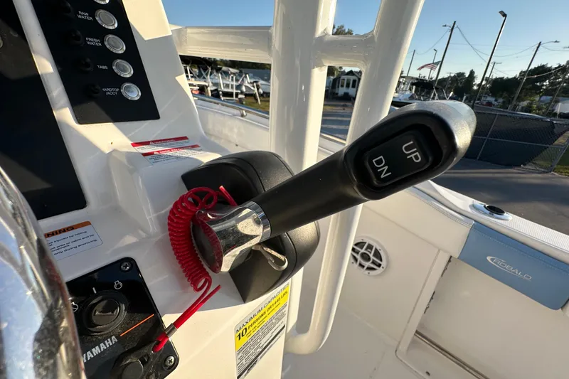 Slide: The Image of Control panel on 2023 Robalo R222 Center Console boat with labeled switches. - 31