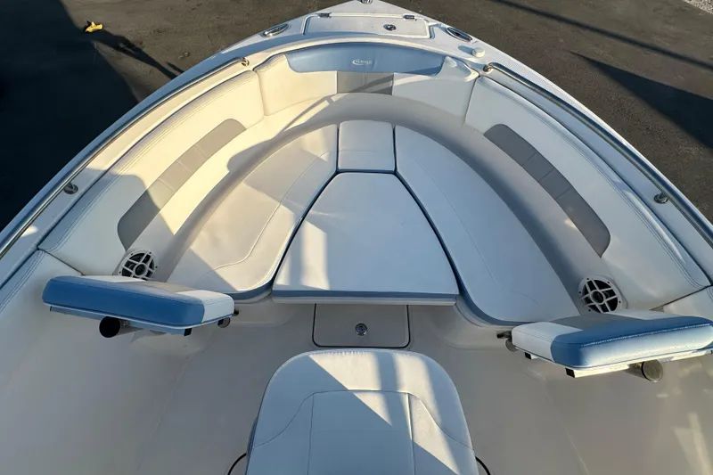 Slide: The Image of 2023 Robalo R222 Center Console boat interior with seating and console view. - 38