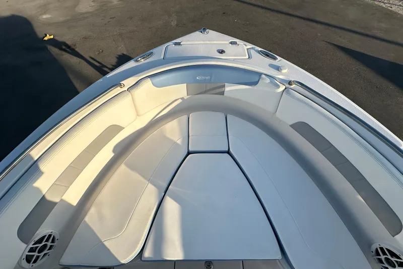 Slide: The Image of 2023 Robalo R222 Center Console boat interior storage compartment open. - 43