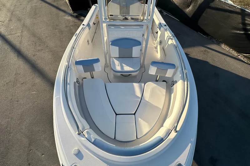 Slide: The Image of 2023 Robalo R222 Center Console boat with spacious seating area. - 45