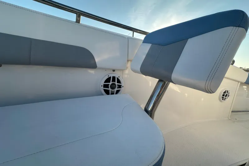 Slide: The Image of 2023 Robalo R222 Center Console boat with spacious seating and sleek design. - 47