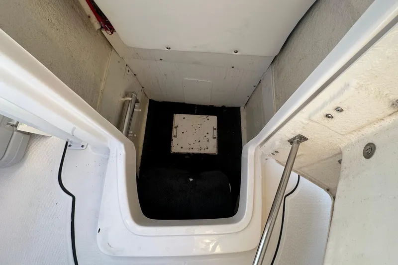 Slide: The Image of 2023 Robalo R222 Center Console boat interior with seating and console view. - 53