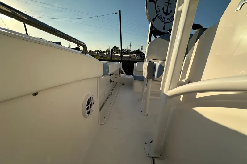 Slide: The Image of 2023 Robalo R222 Center Console boat interior with open storage compartment. - 54