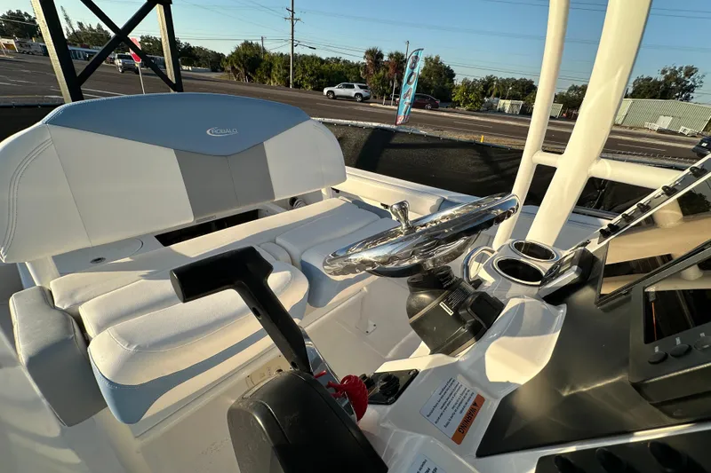 Slide: The Image of 2023 Robalo R222 Center Console storage compartment interior view. - 55