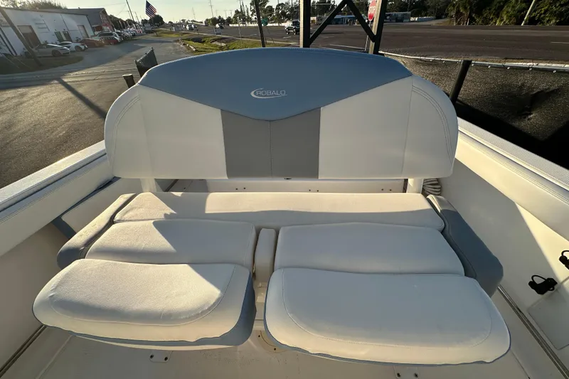 Slide: The Image of 2023 Robalo R222 Center Console boat interior with steering wheel and controls. - 57