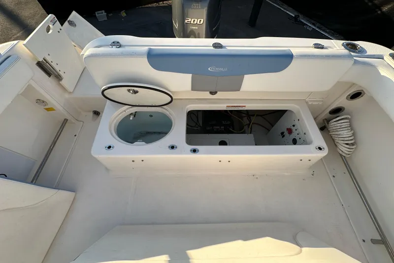 Slide: The Image of 2023 Robalo R222 Center Console boat seat in white and blue upholstery. - 58