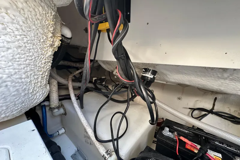 Slide: The Image of 2023 Robalo R222 Center Console boat interior detail with drain and fittings. - 63