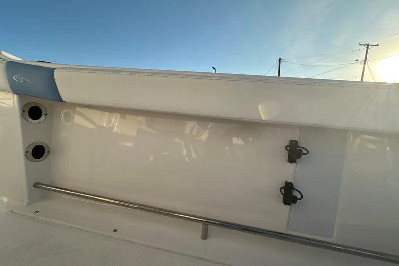 Slide: The Image of 2023 Robalo R222 Center Console boat battery compartment with wiring and components. - 66