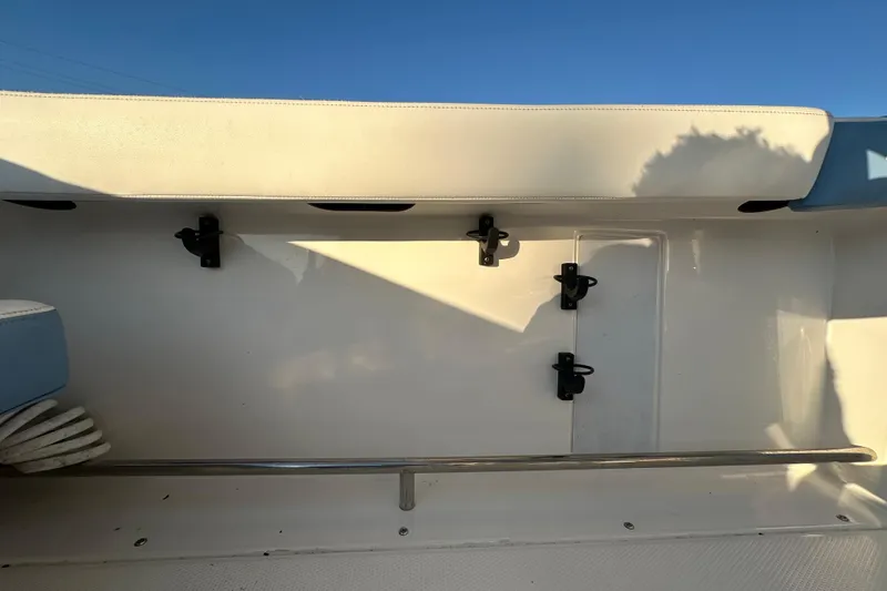 Slide: The Image of Control panel of 2023 Robalo R222 Center Console boat with wiring and switches. - 67