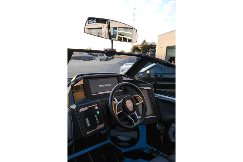 Slide: The Image of 2024 Supra SL interior with modern dashboard and steering wheel design. - 12