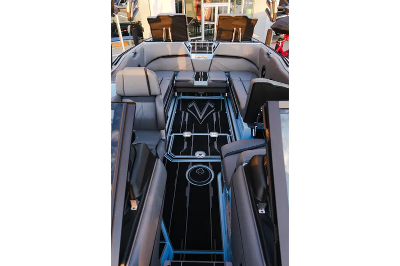 Slide: The Image of 2024 Supra SL boat interior with sleek seating and modern design. - 15