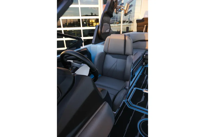 Slide: The Image of 2024 Supra SL interior with sleek design and modern steering wheel. - 16