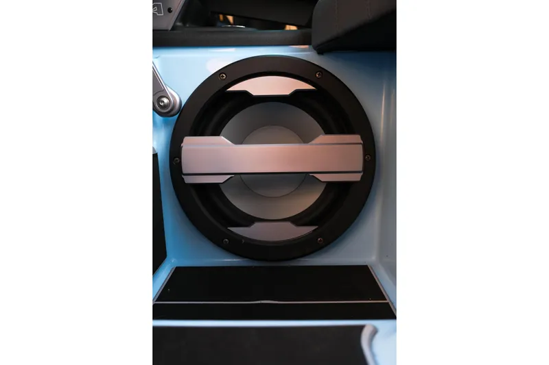 Slide: The Image of 2024 Supra SL speaker system in a sleek blue interior. - 18