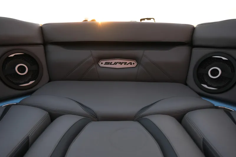 Slide: The Image of 2024 Supra SL boat interior with premium speakers and sleek leather seating. - 20