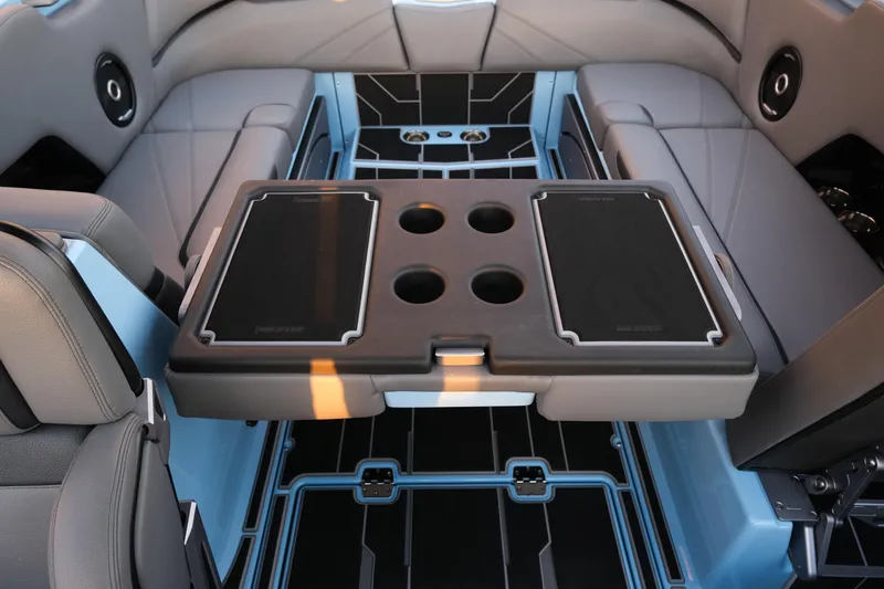 Slide: The Image of 2024 Supra SL boat interior with seating and multifunctional table. - 22