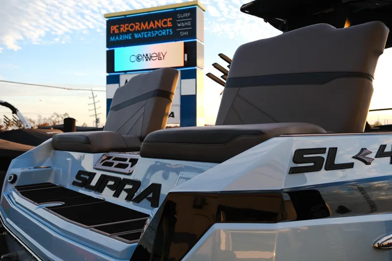 Slide: The Image of 2024 Supra SL boat at Performance Marine Watersports dealership. - 8